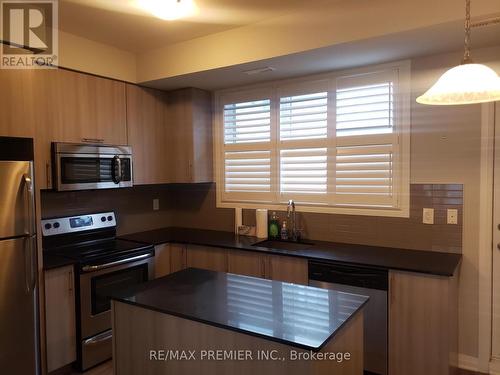 18 Caroline Carpenter Grove, Toronto, ON - Indoor Photo Showing Kitchen