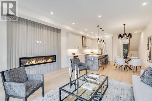 2B Iroquois Avenue, Mississauga, ON - Indoor Photo Showing Living Room With Fireplace