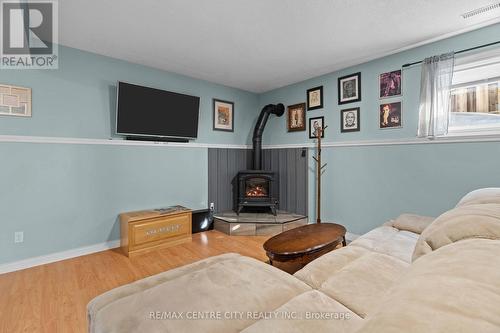 98 Laura Lane, Strathroy-Caradoc (Ne), ON - Indoor With Fireplace