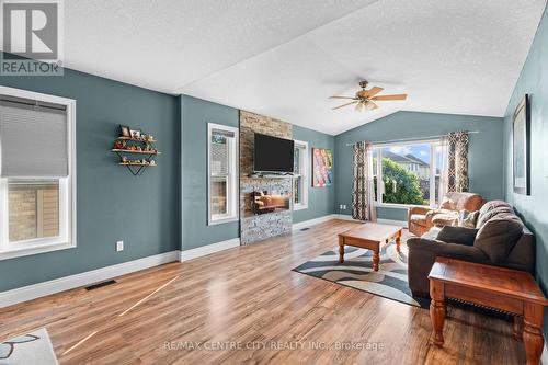 98 Laura Lane, Strathroy-Caradoc (Ne), ON - Indoor Photo Showing Living Room With Fireplace