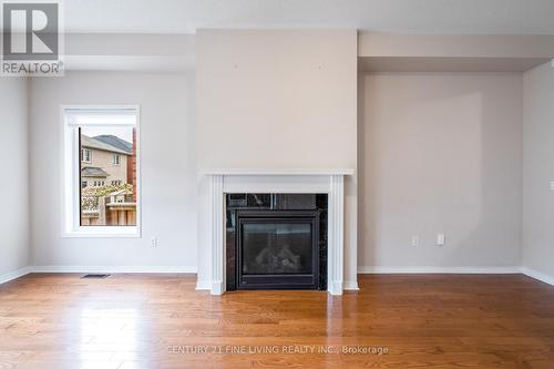 27 Locarno Street, Brampton, ON - Indoor Photo Showing Living Room With Fireplace