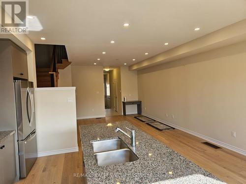 2078 Coppenwood   Common, Burlington, ON - Indoor Photo Showing Kitchen With Double Sink