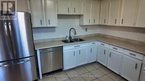 336 - 2645 Jane Street, Toronto, ON - Indoor Photo Showing Kitchen With Double Sink