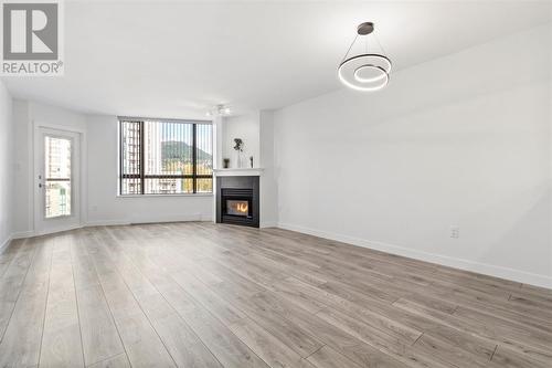 1006 1190 Pipeline Road, Coquitlam, BC - Indoor Photo Showing Living Room With Fireplace