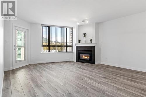 1006 1190 Pipeline Road, Coquitlam, BC - Indoor Photo Showing Living Room With Fireplace