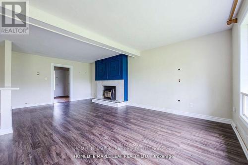 12629 Second Line, Milton, ON - Indoor Photo Showing Living Room With Fireplace