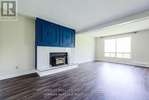 12629 Second Line, Milton, ON - Indoor Photo Showing Living Room With Fireplace