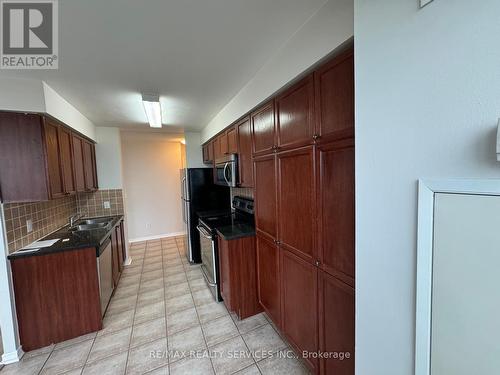 1604 - 4889 Kimbermount Avenue, Mississauga, ON - Indoor Photo Showing Kitchen With Double Sink