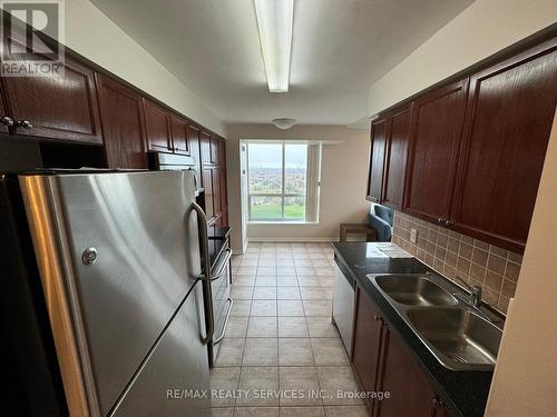 1604 - 4889 Kimbermount Avenue, Mississauga, ON - Indoor Photo Showing Kitchen With Double Sink