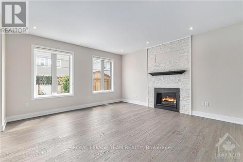 147 Equitation Circle, Ottawa, ON - Indoor Photo Showing Living Room With Fireplace