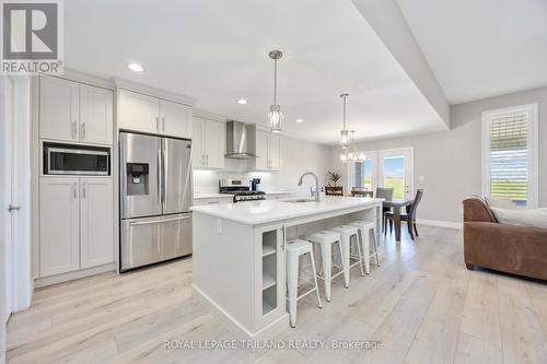 Bright and white kitchen - 4062 Van Bree Drive, Plympton-Wyoming (Plympton Wyoming), ON - Indoor Photo Showing Kitchen With Upgraded Kitchen