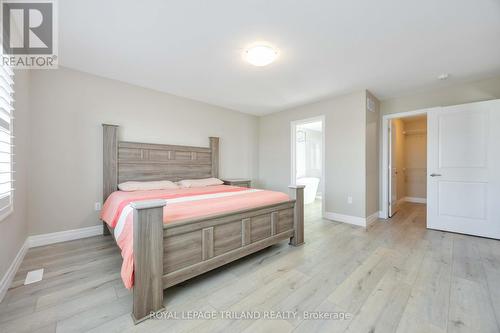 Primary bedroom with ensuite and walk in closet - 4062 Van Bree Drive, Plympton-Wyoming (Plympton Wyoming), ON - Indoor Photo Showing Bedroom