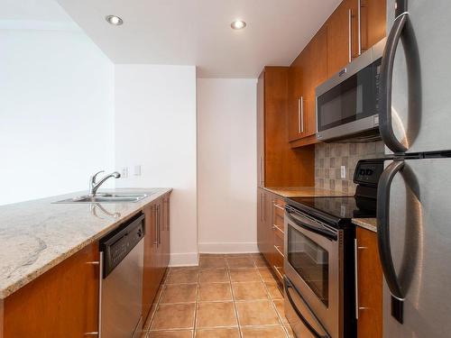 Cuisine - 801-1315 Boul. De Maisonneuve O., Montréal (Ville-Marie), QC - Indoor Photo Showing Kitchen With Double Sink