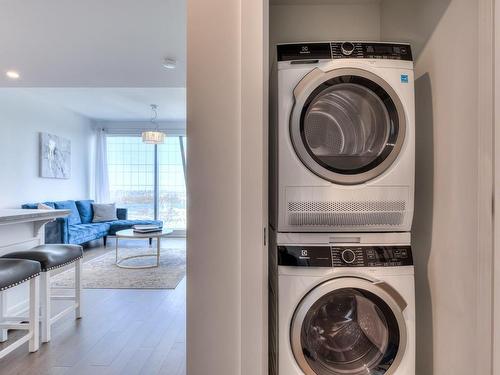 Salle de lavage - 3208-720 Rue St-Jacques, Montréal (Ville-Marie), QC - Indoor Photo Showing Laundry Room