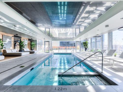 Piscine - 3208-720 Rue St-Jacques, Montréal (Ville-Marie), QC - Indoor Photo Showing Other Room With In Ground Pool