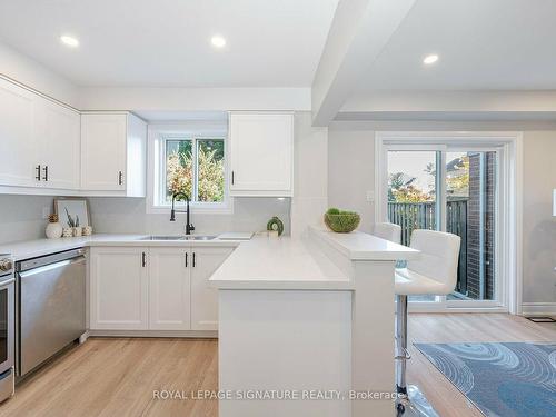 58-5659 Glen Erin Dr, Mississauga, ON - Indoor Photo Showing Kitchen With Double Sink