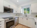 58-5659 Glen Erin Dr, Mississauga, ON  - Indoor Photo Showing Kitchen With Stainless Steel Kitchen With Double Sink 