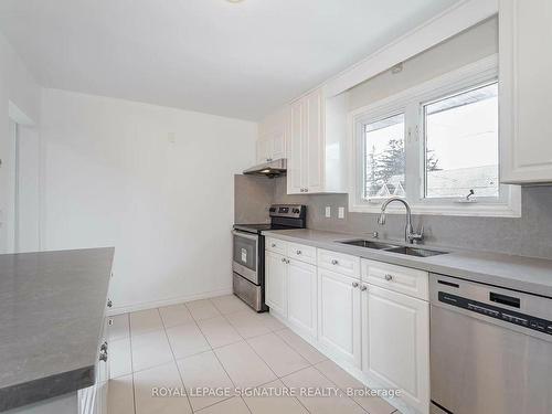 2557 Mindemoya Rd, Mississauga, ON - Indoor Photo Showing Kitchen With Double Sink