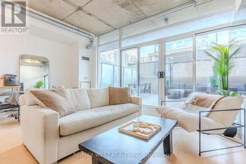 212 - 66 Portland Street, Toronto, ON - Indoor Photo Showing Living Room