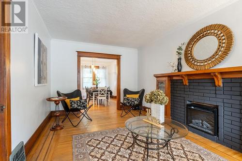 56 Newton Avenue, Hamilton, ON - Indoor Photo Showing Living Room With Fireplace