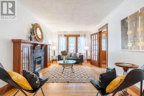 56 Newton Avenue, Hamilton, ON - Indoor Photo Showing Living Room With Fireplace