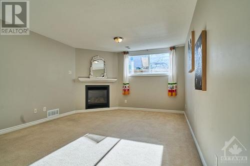 Fully finished basement - 348 Selene Way, Ottawa, ON - Indoor With Fireplace