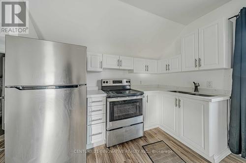 Upper - 158 Celina Street, Oshawa, ON - Indoor Photo Showing Kitchen With Double Sink