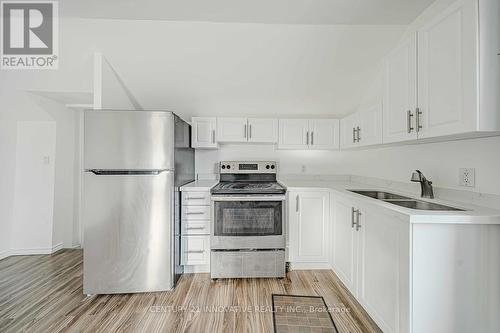 Upper - 158 Celina Street, Oshawa, ON - Indoor Photo Showing Kitchen With Double Sink