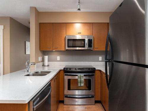 402-751 Fairfield Rd, Victoria, BC - Indoor Photo Showing Kitchen With Stainless Steel Kitchen With Double Sink