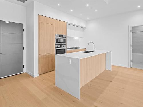 1505-2000 Hannington Rd, Langford, BC - Indoor Photo Showing Kitchen With Double Sink