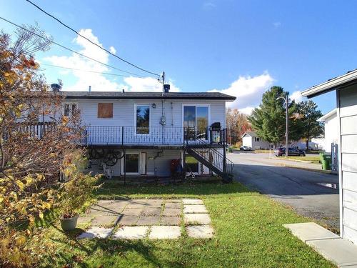 Back facade - 176 Rue Villeneuve, Val-D'Or, QC - Outdoor With Deck Patio Veranda