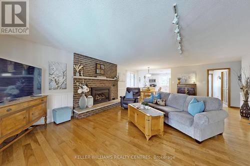 121 Queen Street, Kawartha Lakes, ON - Indoor Photo Showing Living Room With Fireplace