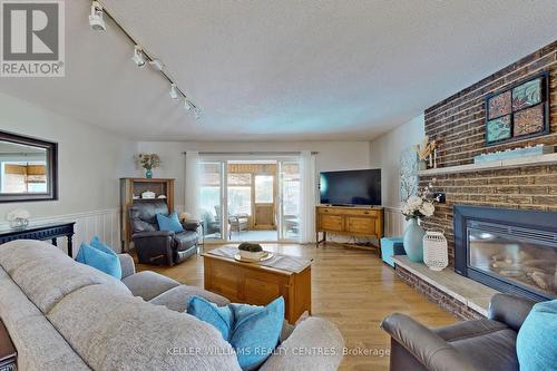 121 Queen Street, Kawartha Lakes, ON - Indoor Photo Showing Living Room With Fireplace