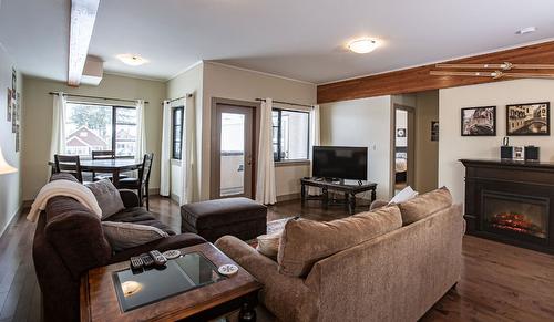 205-309 First Street, Revelstoke, BC - Indoor Photo Showing Living Room With Fireplace