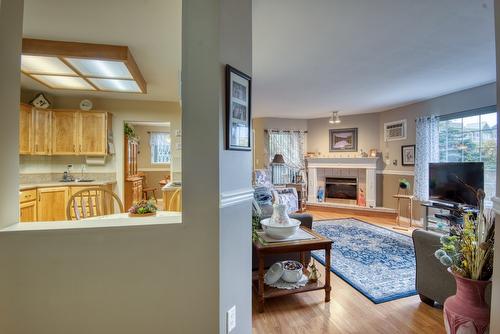 101-374 Winnipeg Street, Penticton, BC - Indoor Photo Showing Living Room With Fireplace