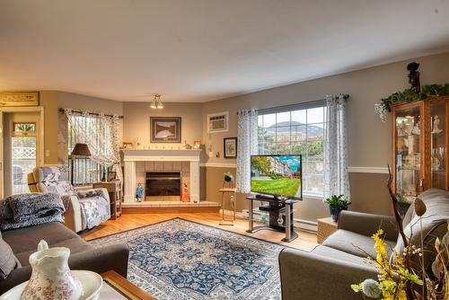 101-374 Winnipeg Street, Penticton, BC - Indoor Photo Showing Living Room With Fireplace