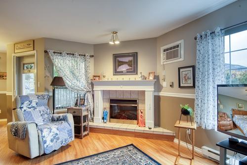 101-374 Winnipeg Street, Penticton, BC - Indoor Photo Showing Living Room With Fireplace