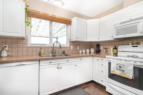 1310 Mary Court, Kelowna, BC - Indoor Photo Showing Kitchen With Double Sink