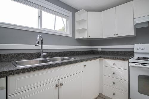 1310 Mary Court, Kelowna, BC - Indoor Photo Showing Kitchen With Double Sink