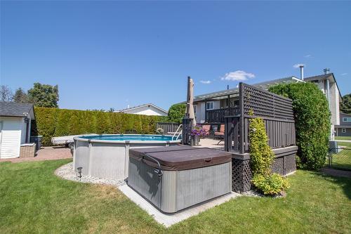 1310 Mary Court, Kelowna, BC - Outdoor With Above Ground Pool