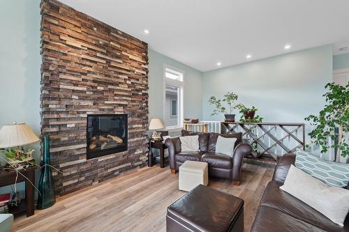 5048 Turtle Pond Place, Vernon, BC - Indoor Photo Showing Living Room With Fireplace