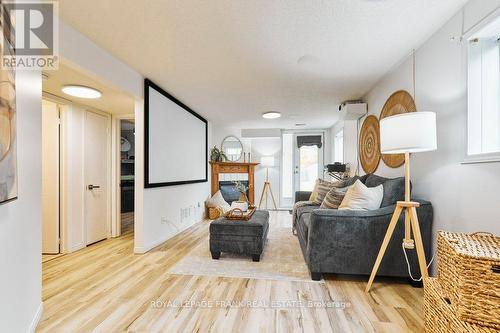 44 Mcfeeters Crescent, Clarington (Bowmanville), ON - Indoor Photo Showing Living Room With Fireplace