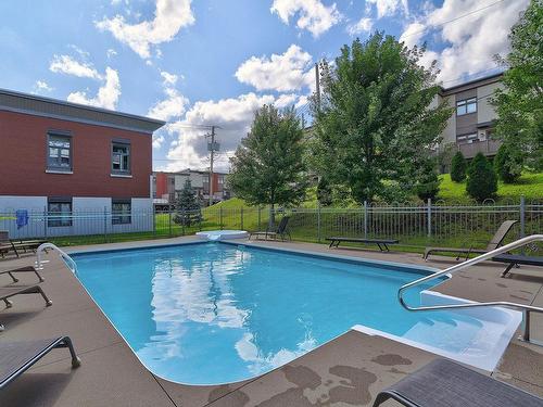 Pool - 413-2400 Av. De Lisieux, Québec (Beauport), QC - Outdoor With In Ground Pool