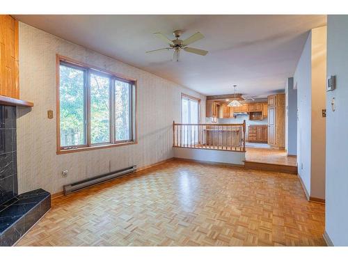 Family room - 909 Rue De La Richardière, Boucherville, QC - Indoor With Fireplace