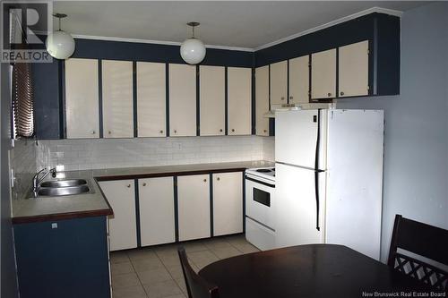 115 Elizabeth Street, Woodstock, NB - Indoor Photo Showing Kitchen With Double Sink