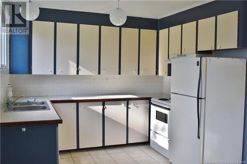 115 Elizabeth Street, Woodstock, NB - Indoor Photo Showing Kitchen With Double Sink