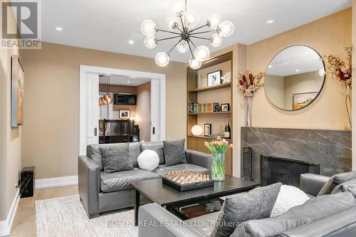 68 Sutherland Drive, Toronto, ON - Indoor Photo Showing Living Room With Fireplace