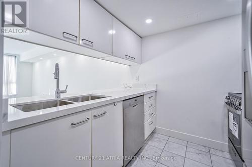 611 - 38 Elm Street, Toronto, ON - Indoor Photo Showing Kitchen With Double Sink With Upgraded Kitchen