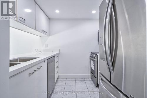 611 - 38 Elm Street, Toronto, ON - Indoor Photo Showing Kitchen With Double Sink