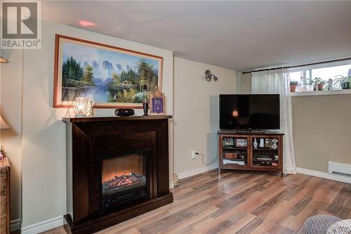 75 Birch, Garson, ON - Indoor Photo Showing Living Room With Fireplace